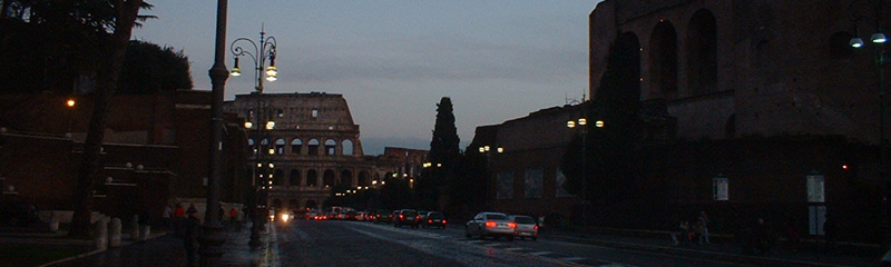 Via dei Fori Imperiali street with Colosseum at bottom