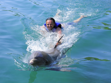 Riding a dolphin