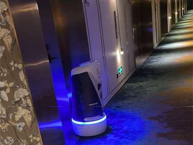 Hotel robot delivering room service