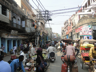 Going through Chandni Chowk by cyclerickshaw