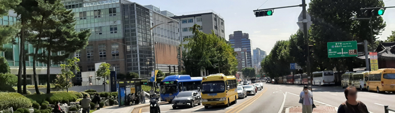 Bus stop in front of the palace