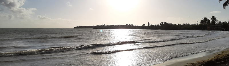 Playa frente a Sunrise Cottage